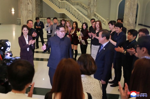 North Korean leader Kim Jong Un and his wife Ri Sol Ju enjoyed a performance from South Korean K-pop singers in a concert under the title "Spring is Coming" at the East Pyongyang Grand Theatre in North Korea on April 1